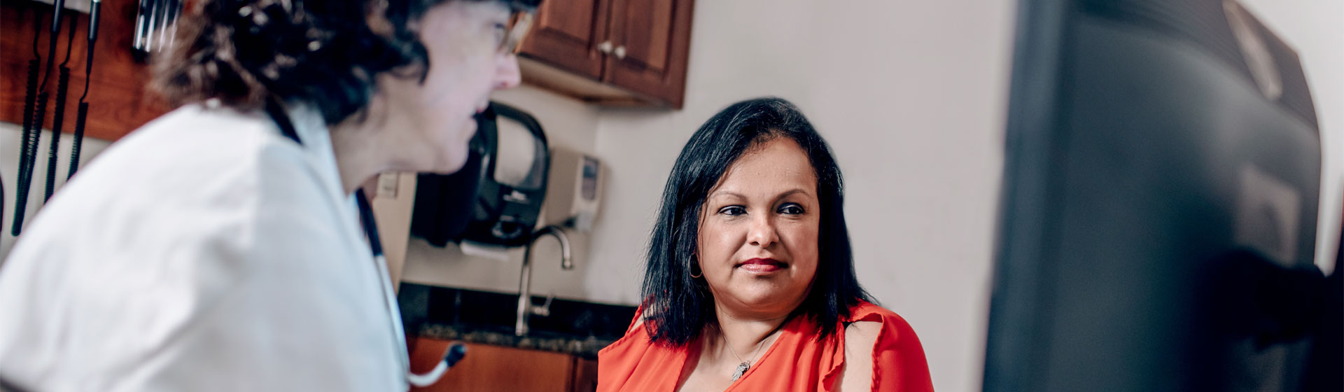 A Latina woman at a doctor's office