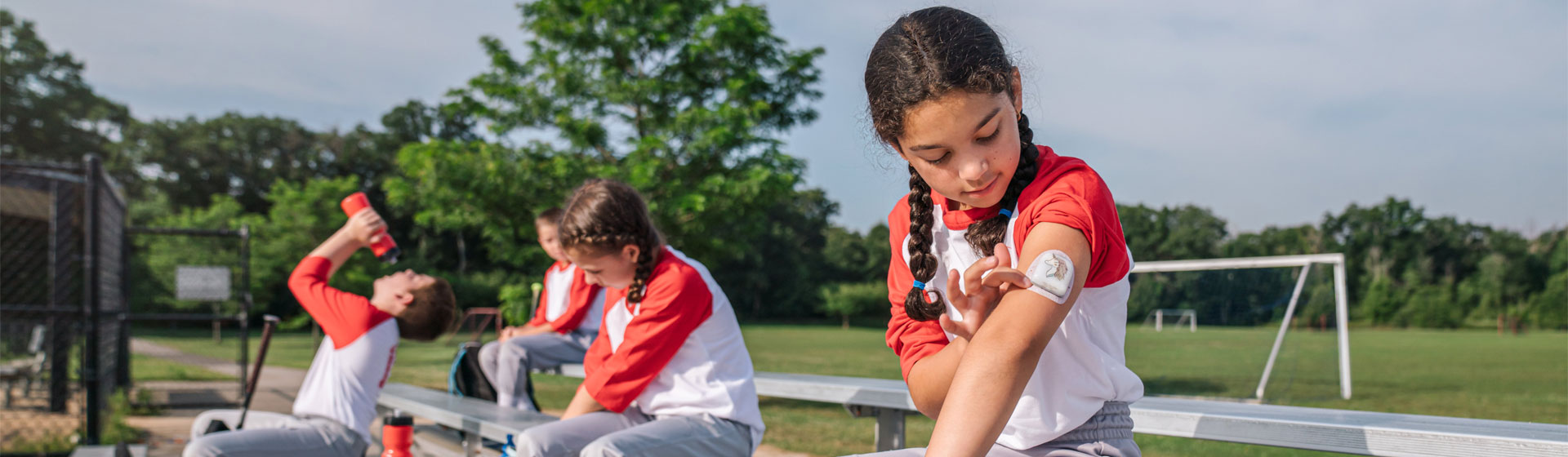 Child with diabetes at baseball practice