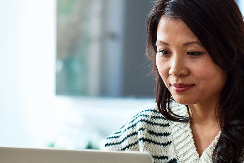 Woman looking at a computer