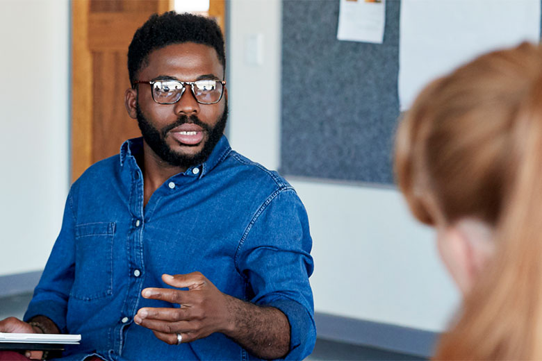 Man talking to a woman