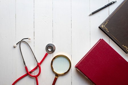 Stethoscope and book