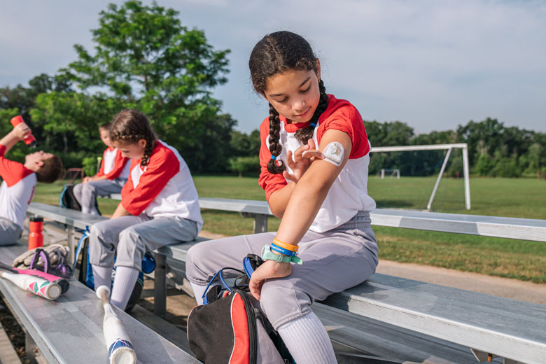 Child with diabetes at baseball practice