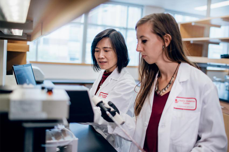 Two female researchers in a lab